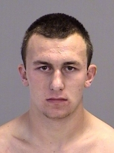 Illustration for article titled Who The Hell Is Johnny Manziel, And Why Wasn't He Wearing A Shirt In His Mug Shot? A Guide